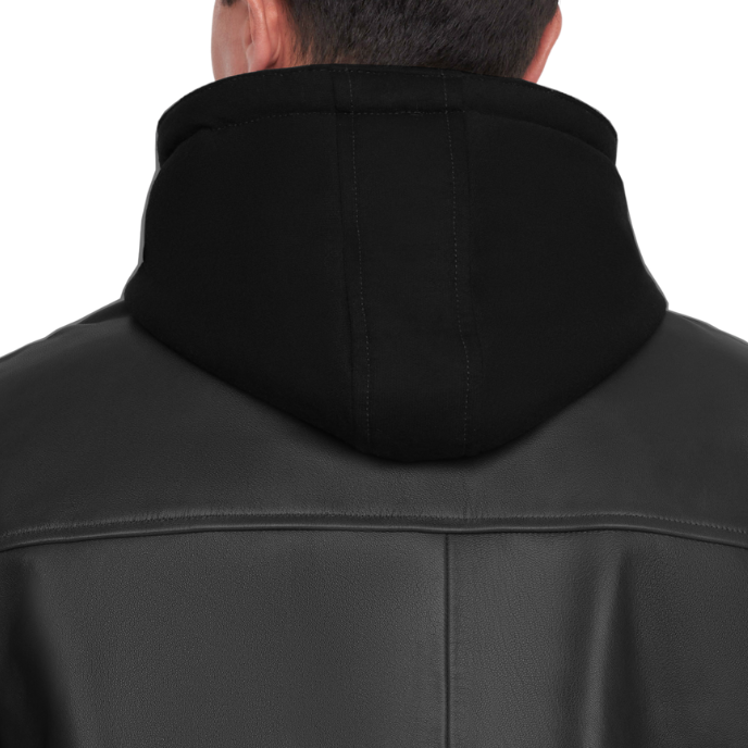Detalle de capucha de chamarra 'Híbrida' 1141 de piel de borrego negra con capucha textil desmontable.